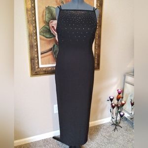Very pretty black dress with beaded top and double strap detail
